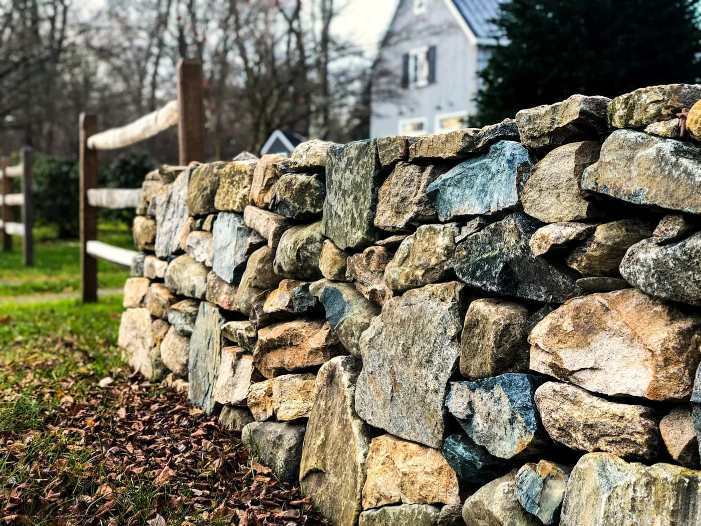Dry-laid stone coursework on the middle terrace wall